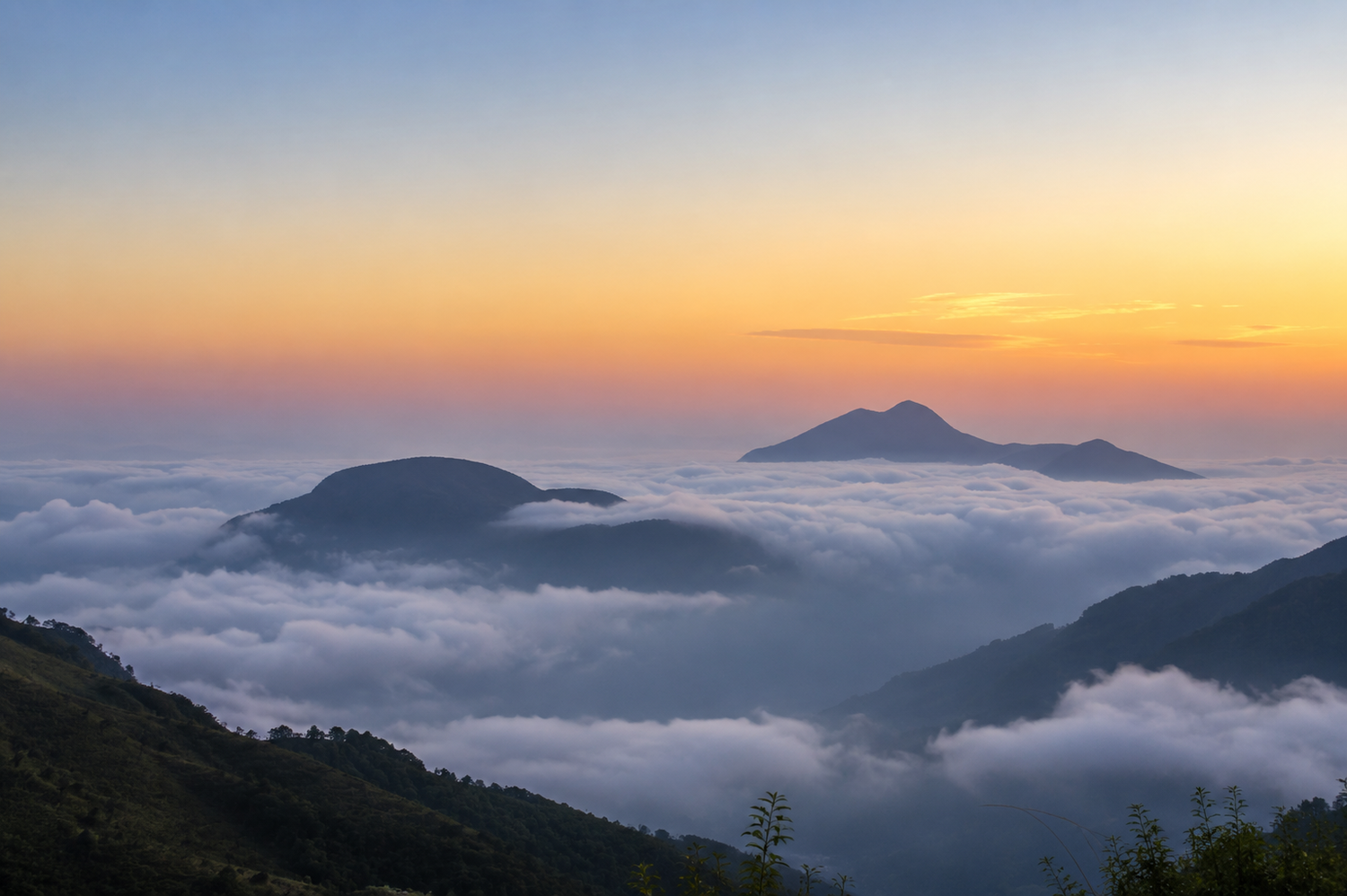 Sea of clouds at sunrise above the mountains of Ren'ai Township, Nantou County, Taiwan.